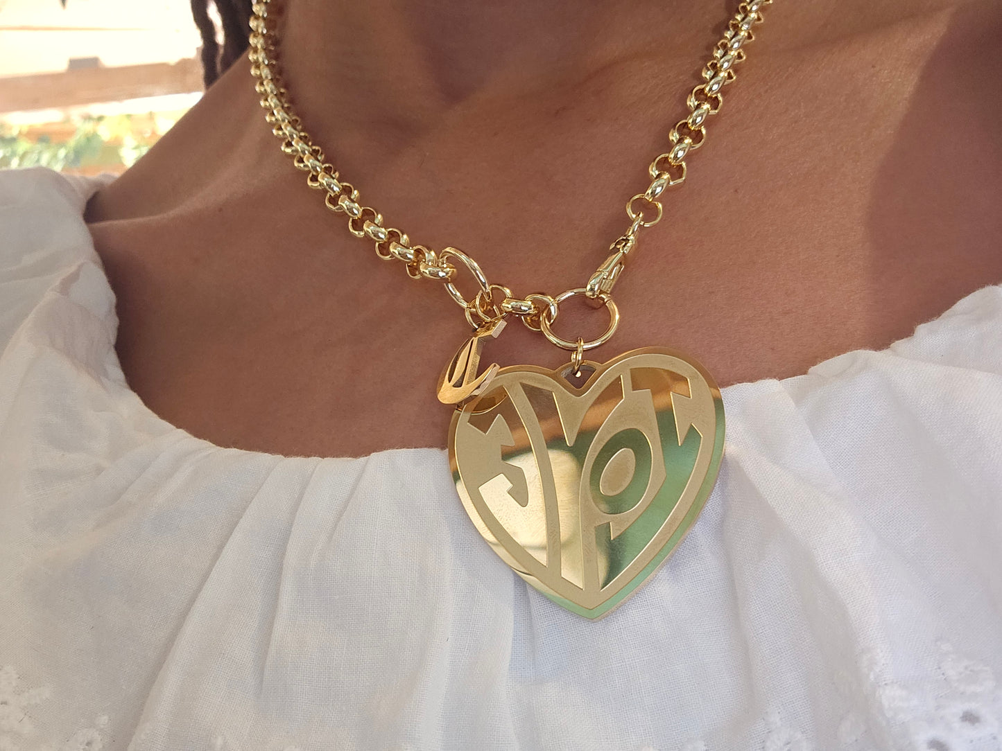 LOVE that Gold Heart Necklace